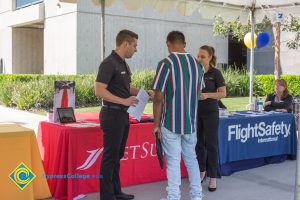 Career Fair 2019 tables with company representatives