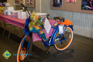 Gift baskets in a bike at End of Year Luau
