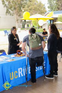 Students at Transfer Fair tables.