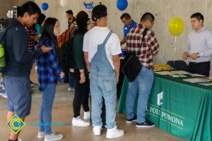 Students at Transfer Fair tables.