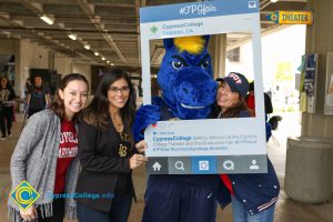 Three women with Charlie the Charger