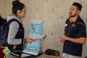 UC Santa Barbara representative speaking to a student at the 2017 Transfer Fair.