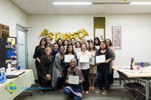 Psi Beta Members of a graduating Psychology class pose with President JoAnna Schilling.