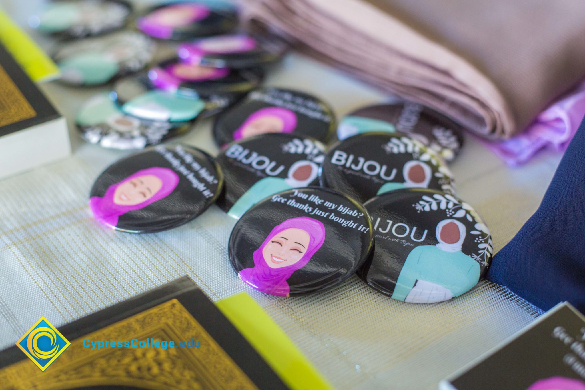 Buttons on a table for Hijab Day.