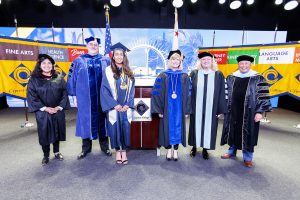 photo of commencement participants in regalia