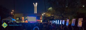 Crowd watching Yom HaShoah event.