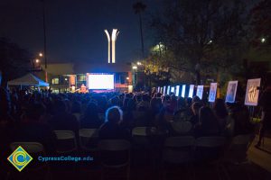 Crowd watching Yom HaShoah event.