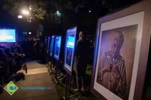 Holocaust survivor portraits on display at the 2016 Yom HaShoah event.