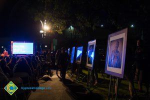 Holocaust survivor portraits on display at the 2016 Yom HaShoah event.