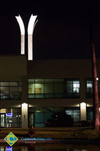 The campanile lit in white.