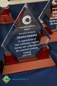 Close-up of Associated Students award for Monica Santana