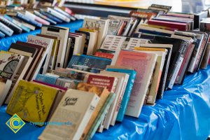 Tables full of books.