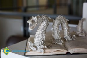 Dragon made of book pages.