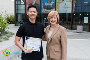 President, JoAnna Schilling with a Foundation Scholarship Award recipient Huy Nguyen.