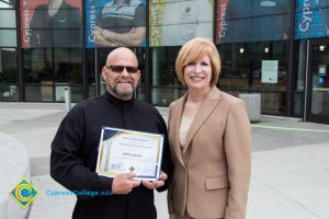 President, JoAnna Schilling with Foundation Scholarship Award recipient John Lasater.