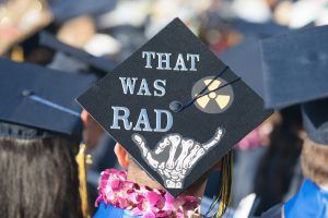 Graduation cap with skeleton hand that reads "That was RAD."