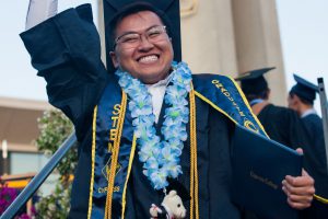 Graduate smiling.