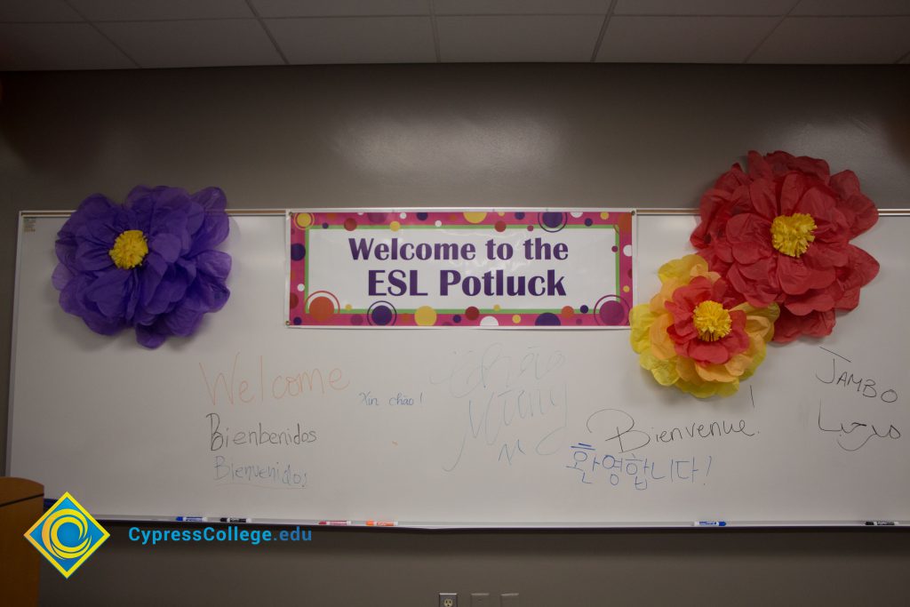 Welcome to ESL Potluck sign