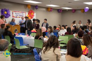 Students and staff at the ESL potluck.