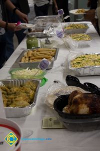 Potluck dishes on table.