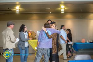 Staff greeting each other for Opening Day