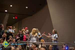 Roses being handed out at Fall Opening Day