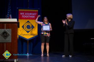 Marcia Jeffredo received an award from JoAnna Schilling at Fall Opening Day