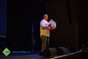 Paul de Dios holding a beach ball.