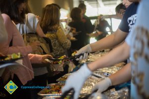 Food being served in a line