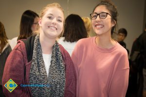 Two smiling students.