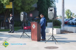 VRC Director, Juan Garcia speaking at the podium.