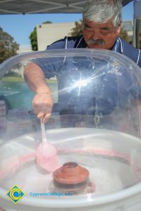 Dave Okawa making cotton candy.