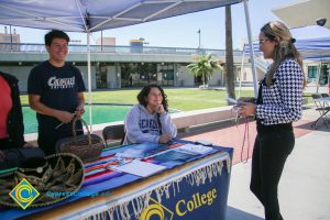 Students at Puente booth