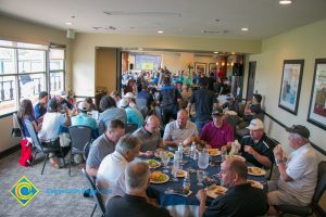 Foundation 2018 Golf Classic attendees eating.