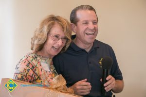 Gail Tayler and Howard Kummerman laughing.