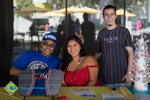 Staff and students at Club Carnival booth