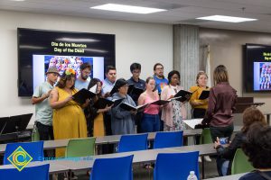 Students singing at Dia de Los Muertos event