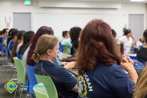 Staff and students in a Dia de Los Muertos lecture.