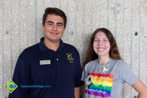 Two students smiling