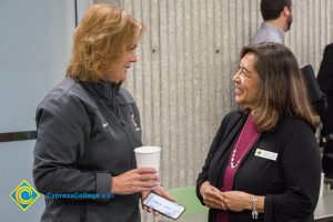 Staff talking at Superintendent Breakfast