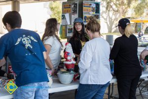 Customers at the cup and bowl sale.