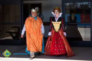 Staff dressed as the King and Queen of Hearts