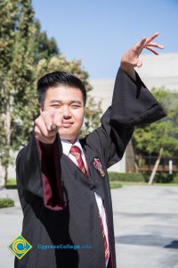 Young man pointing.