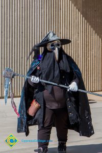 Student in gothic dark Halloween costume