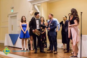 Students on stage at Associated Students banquet