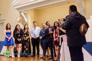 Students on stage at Associated Students banquet