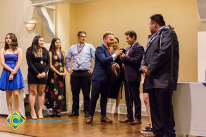 Students on stage at Associated Students banquet