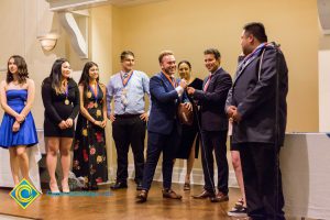 Students on stage at Associated Students banquet