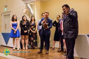 Students on stage at Associated Students banquet