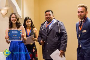 Students on stage at Associated Students banquet